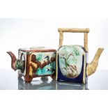 TWO LATE 19TH CENTURY ENGLISH ORIENTAL-STYLE MAJOLICA TEAPOTS
one of square form decorated with a