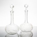 PAIR OF LATE 19TH/EARLY 20TH CENTURY CUT CRYSTAL DECANTERS
each of round form with tall necks and