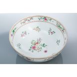 19TH CENTURY SAMSON ARMORIAL FAMILLE ROSE-STYLE PUNCH BOWL
typically decorated with an armorial