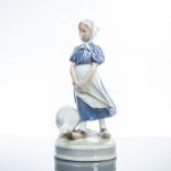 ROYAL COPENHAGEN FIGURE OF A GOOSE GIRL
modelled on a naturalistic base, green printed mark, pat.