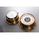 BRASS BULKHEAD UNITED STATES MARITIME COMMISSION BAROMETER
by Taylor, USA, signed silvered dial,