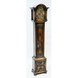 CARVED OAK GRANDMOTHER CLOCK
the unsigned eight day three train movement with anchor escapement