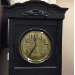 EBONISED CARVED OAK LONGCASE CLOCK
the unsigned weight driven movement striking on a gong, the 10.
