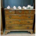 GEORGE III MAHOGANY OBLONG CHEST
with three short drawers over three long drawers,