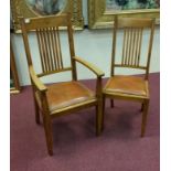 SEVEN OAK DINING CHAIRS OF ARTS AND CRAFTS DESIGN 
with seven vertical splats,