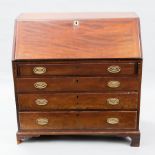 REGENCY MAHOGANY BUREAU
the fall front writing surface enclosing a fitted interior,