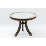 EBONISED AND GILTWOOD CENTRE TABLE IN THE REGENCY STYLE
the circular mirrored top with gilt border