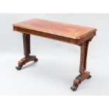 POST-REGENCY ROSEWOOD OBLONG LIBRARY TABLE 
with scroll moulded end supports with spiral column