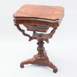 EARLY VICTORIAN MAHOGANY NEEDLEWORK TABLE 
the matched quarter veneer top with hinged cover