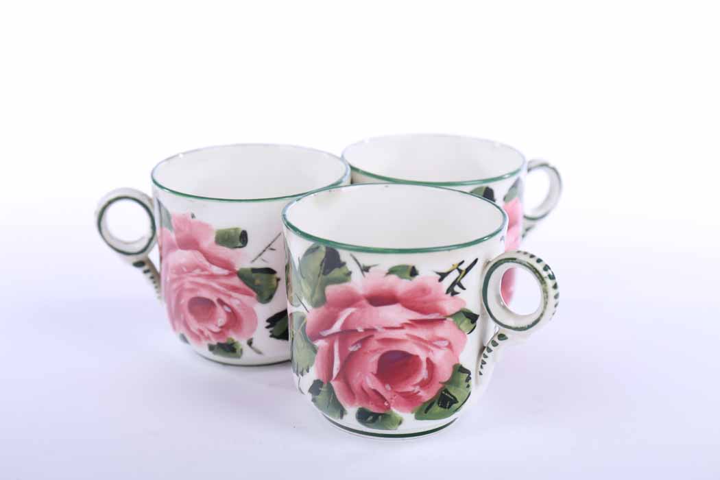 INTERESTING WEMYSS WARE BONE CHINA TEA SERVICE decorated by Edwin Sandland with a wide band of