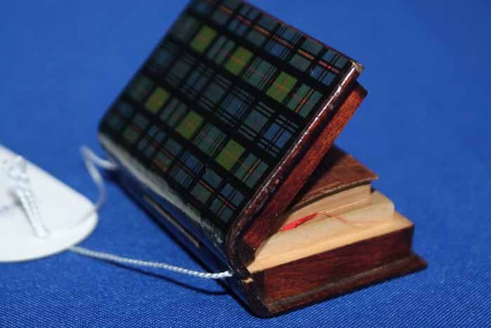 MINIATURE LEATHER BOUND BIBLE contained in a Murray tartanware book shaped box