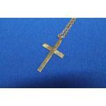 9CT GOLD CROSS PENDANT with associated 9ct gold chain,