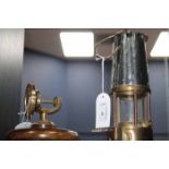 ECCLES BRASS MINER'S LAMP with presentation plaque reading 'Projector Lamp & Lighting,