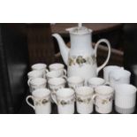 ROYAL DOULTON LARCHMONT COFFEE SET AND A GERMAN ARZBERG COFFEE SET