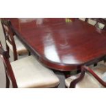 REPRODUCTION MAHOGANY DINING TABLE AND EIGHT CHAIRS
