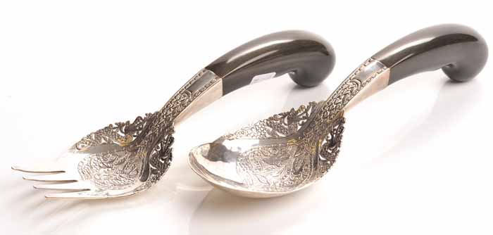 PAIR OF ISLAMIC SILVER SALAD SERVERS the handles on horn,