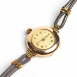 LADY'S EARLY TWENTIETH CENTURY NINE CARAT GOLD WRISTWATCH manual wind movement,