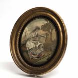 PAIR OF POST-REGENCY SILK NEEDLEWORK OVAL PANELS depicting a shepherdess with sheep and a muse by