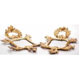 PAIR OF GILT FRAMED SMALL WALL MIRRORS OF 18TH CENTURY DESIGN with outset floral carved cresting,