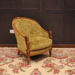 LATE 19TH CENTURY BEECH FRAMED TUB ARMCHAIR upholstered in green dralon, with loose seat cushion,