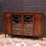MAHOGANY DWARF BOOKCASE OF GEORGE III DESIGN the central section enclosed by two glazed astragal