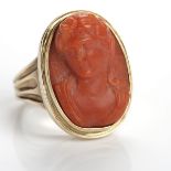 NINETEENTH CENTURY RED CORAL CAMEO RING carved with a bust of a classical women in high relief 23mm