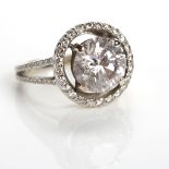 ORNATE DIAMOND SOLITAIRE RING the brilliant cut stone of approximately 3.