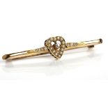 EDWARDIAN SEED PEARL AND DIAMOND BAR BROOCH with openwork heart motif,