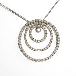 DIAMOND PENDANT designed as concentric circles of brilliant cut diamonds, in nine carat white gold,