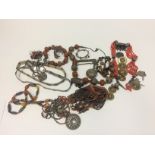 COLLECTION OF BEDOUIN AND MIDDLE EASTERN WHITE METAL JEWELLERY