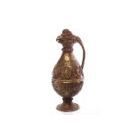 EARLY 20TH CENTURY EASTERN GILT METAL EWER likely Chinese or Tibetan in origin,