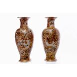 PAIR OF EARLY 20TH CENTURY JAPANESE SATSUMA VASES of baluster form with trumpet necks,