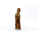 EARLY 20TH CENTURY CHINESE IVORY CARVING modelled as a standing female,