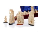 EARLY 20TH CENTURY INDIAN IVORY CHESS SET comprising thirty two pieces, the largest 7.