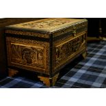 EARLY 20TH CENTURY CHINESE CARVED WOOD CHEST carved overall with figural scenes,