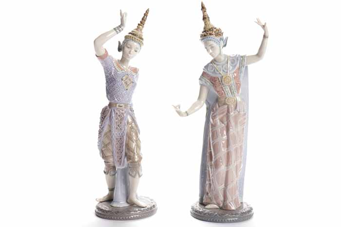 PAIR OF LLADRO FIGURES OF BURMESE DANCERS each posed with arms aloft and outstretched,