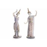 PAIR OF LLADRO FIGURES OF BURMESE DANCERS each posed with arms aloft and outstretched,