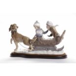 LARGE LLADRO GROUP modelled as two children in a sleigh being pulled by a dog, blue printed mark,