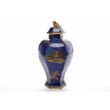 CARLTONWARE HEXAGONAL BALLUSTER VASE with gilt decoration on a blue ground depicting Chinese temple