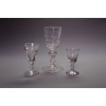 LATE 18TH CENTURY GLASS GOBLET with facetted body and baluster stem, 18.