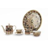 ROYAL CROWN DEBY MINIATURE TEA SET 1128 pattern, comprising a miniature teapot, cream, sugar,