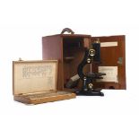 WATSON "SERVICE" MONUCULAR MICROSCOPE Lacquered brass and ebonised finish,