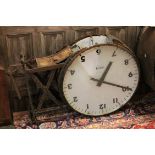 EARLY TWENTIETH CENTURY TWO SIDED STATION CLOCK the signed 24 inch frosted dials with Arabic