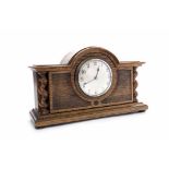 OAK MANTEL CLOCK The French brass movement with lever platform excapement,