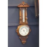 VICTORIAN CARVED OAK ANEROID BAROMETER CLOCK 8 inch white dial, gilt and steel hands,