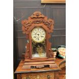 EARLY TWENTIETH CENTURY MANTEL CLOCK The two train movement striking on a gong,