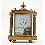 UNUSUAL BRASS MANTEL CLOCK Single train movement, the porcelain dial with painted rural scene,