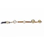 GROUP OF LADY'S WRIST WATCHES comprising four nine carat gold examples,