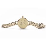 LADY'S RECORD DE LUXE WRISTWATCH quartz movement, the gilt dial with baton hour markers, gilt hands,