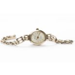 LADY'S GENEVE WRISTWATCH quartz movement, the silvered dial with applied gilt baton hour markers,